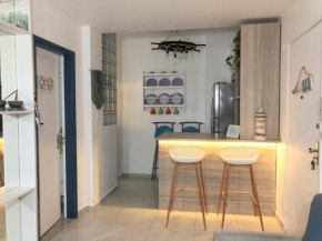 Apto em Santos com AR e Wi-Fi na rua da praia